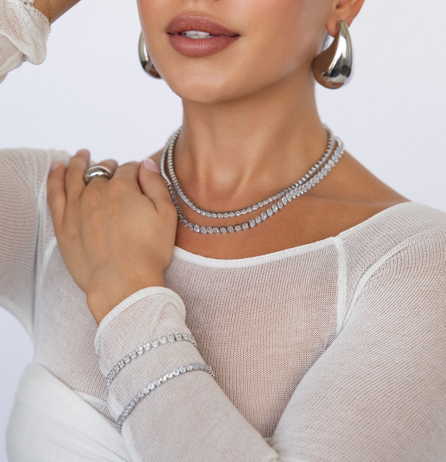 Hour Glass Tennis Bracelet