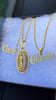 Elegant necklace with oval crystal studded classic jesus piece pendant - layer