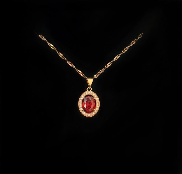 Elegant copper gold necklace with oval bejeweled pendant - ruby red