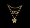 gold necklace layering set: Figaro chain, Butterfly Pendant necklace, and Birthdate necklace